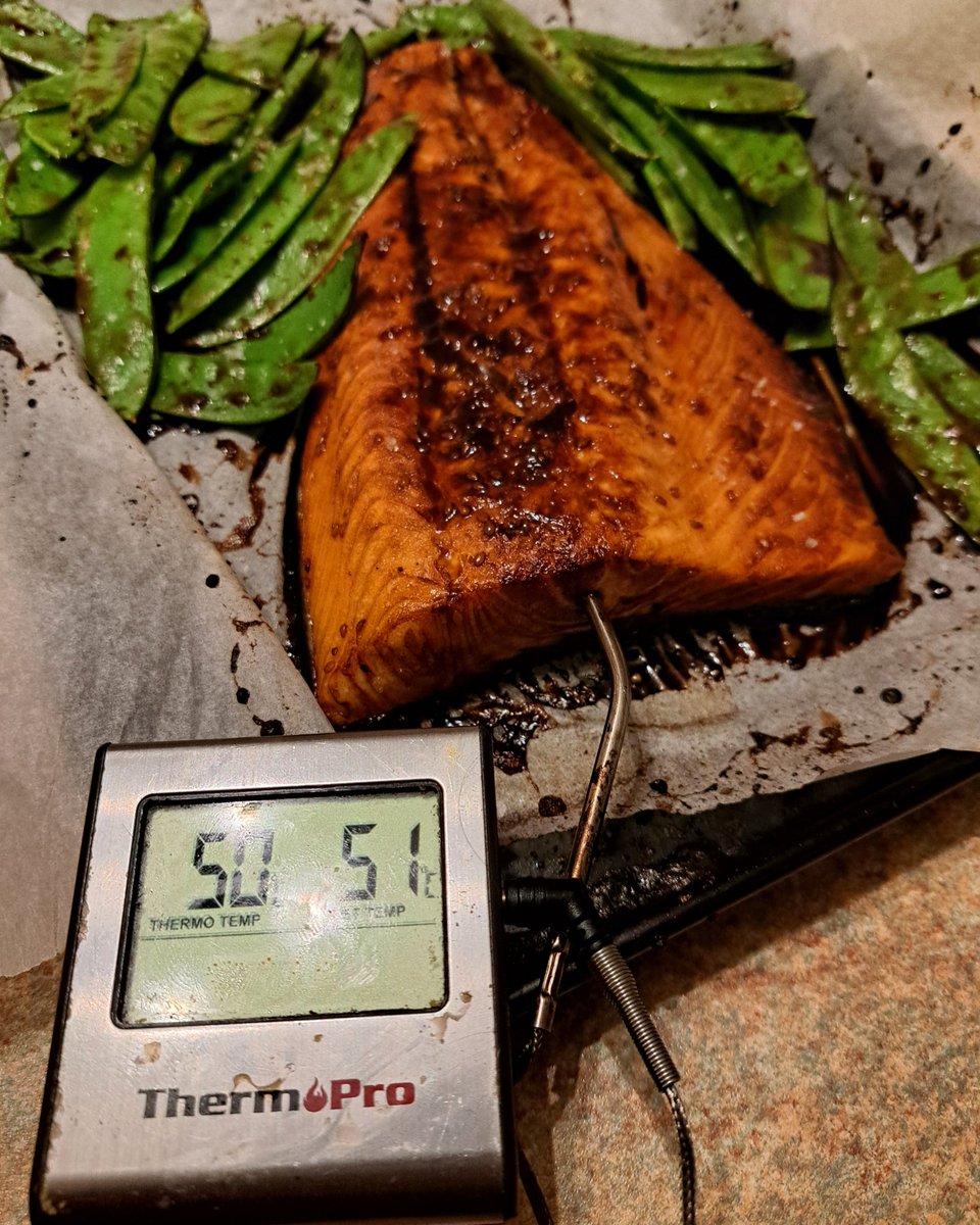 Always cook your fish to 50°C for the best texture. Baked organic salmon teriyaki and mange tout. Mangetout are dressed in teriyaki sauce and added into oven when salmon reaches 25°C. #homeeconomicsforlife
