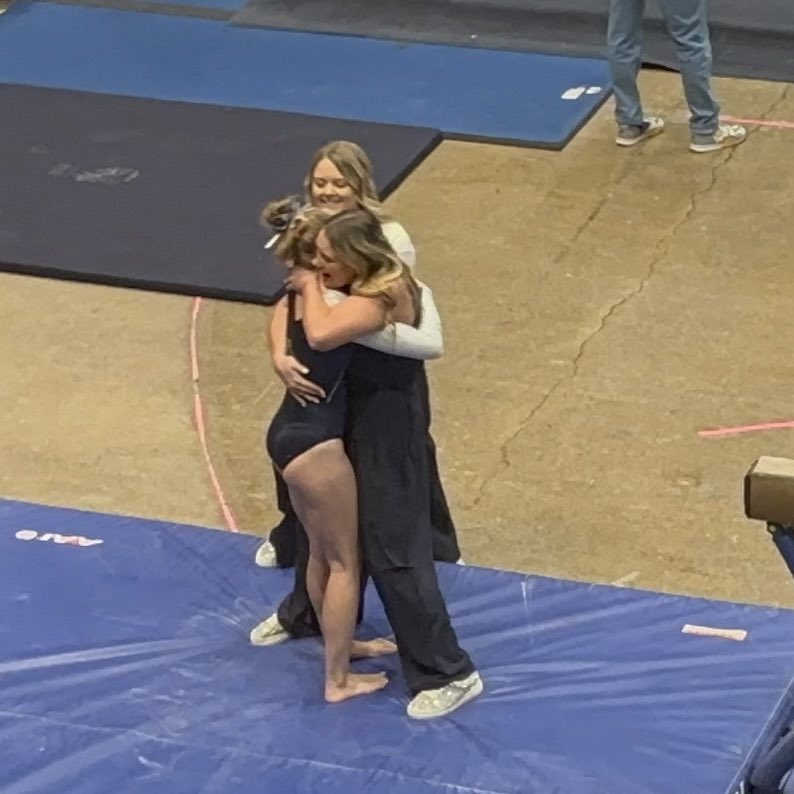 PilotSports's tweet photo. Clara Brinks gets hugs from coaches Kendell Lubben and Abby Gumto after sticking her beam routine at state.
Photo courtesy of proud mom, Jody Brinks. https://t.co/3aSIABCeaK