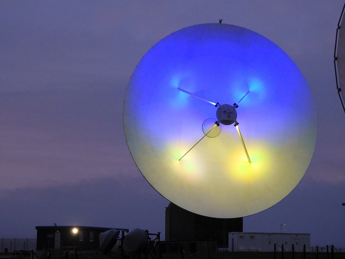 Today marks two years since Putin’s illegal invasion of Ukraine. We continue to support Ukraine by providing intelligence and helping strengthen its cyber capabilities. In solidarity, we've lit up a satellite dish at our Bude site. #SlavaUkrani - Glory to Ukraine 🇺🇦