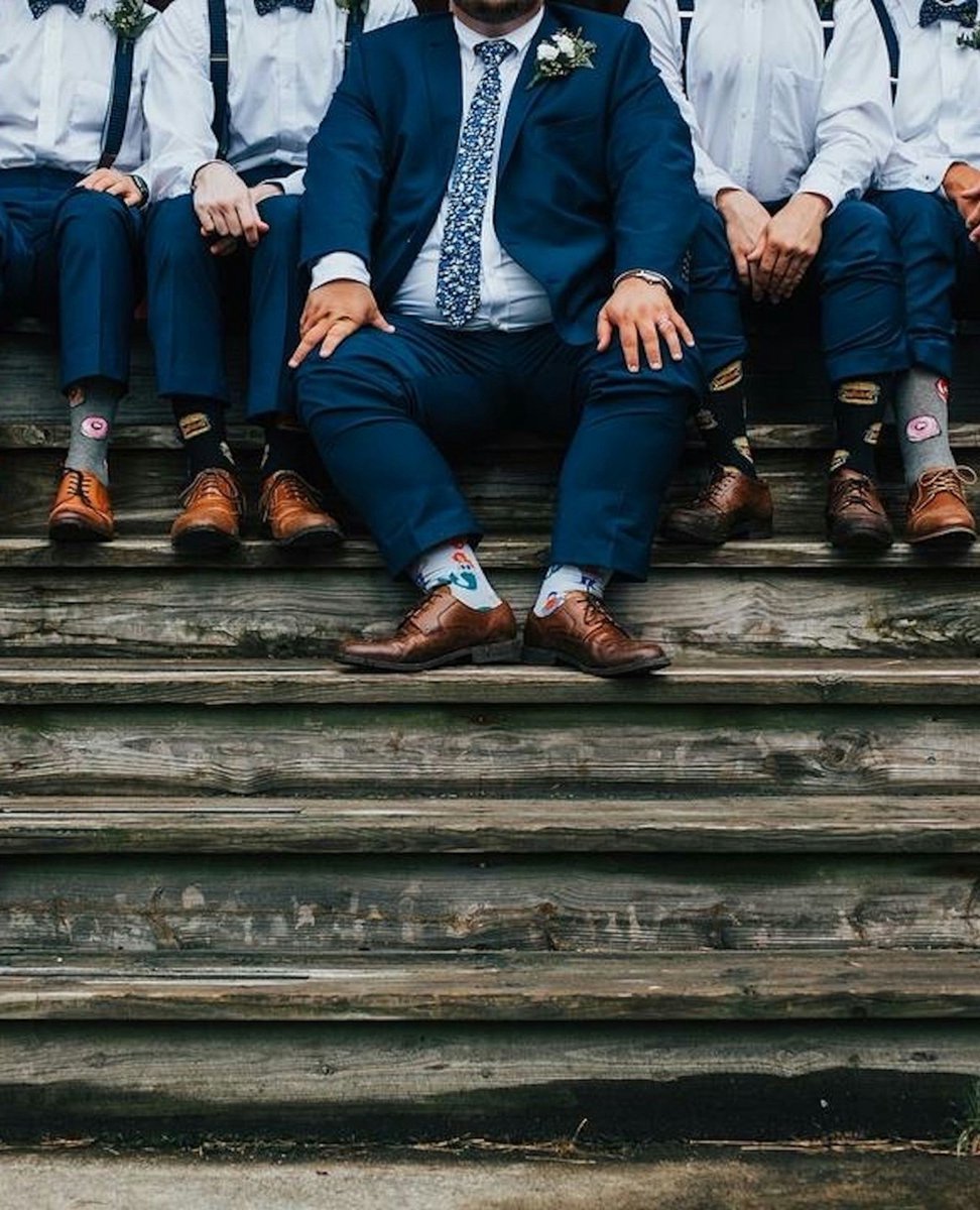 Who says wedding style can't have a twist? Suit up, sock up, and add a dash of unexpected fun for you and your groomsmen on the big day! 👰‍♂️🧦 

#classymen #mensfashion #menstyle #menwithclass #menwithstyle #gentleman #gentstyle #mensaccessories