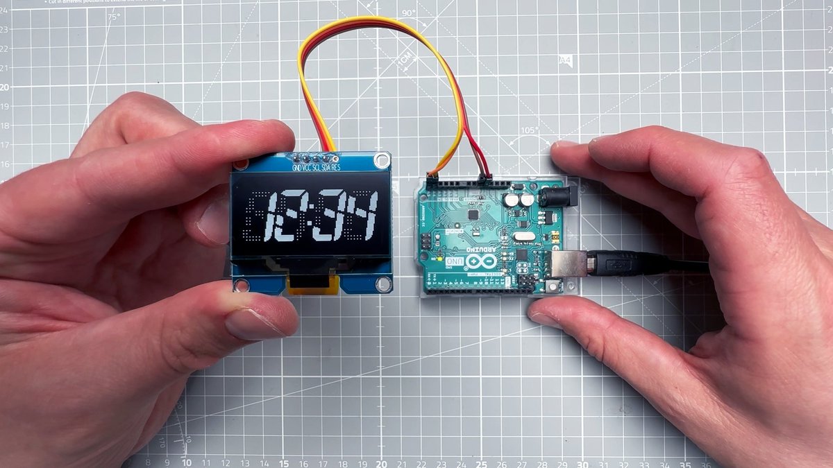 arduino's tweet image. In his latest video, Vaclav Krejci shows off a faux segmented clock design using an Arduino UNO Rev3 and a 128x64 OLED display: youtu.be/OqqPvb8FEHs
