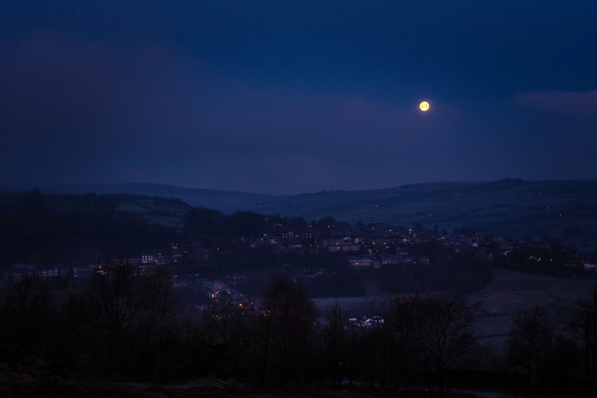 The full moon sets over a frosty Haworth.