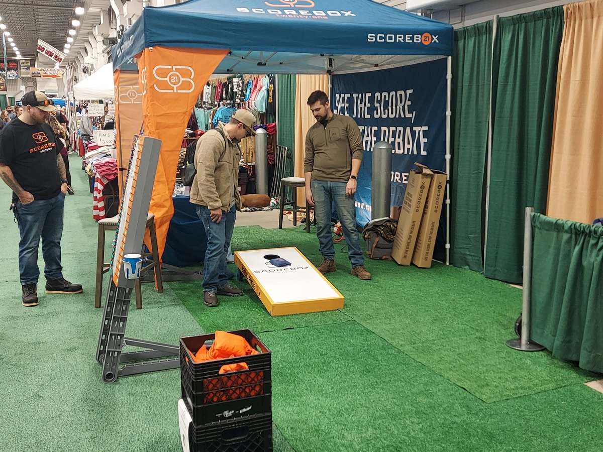 ScoreBox21's tweet photo. Meet Favid and Frankie. They played their buddies, Mitch and Jon. Losers had to pay for their new SB21! Fun times at the Boat, Sport &amp; Travel Show! #seethescorestopthedebate https://t.co/wH3f5tDClE