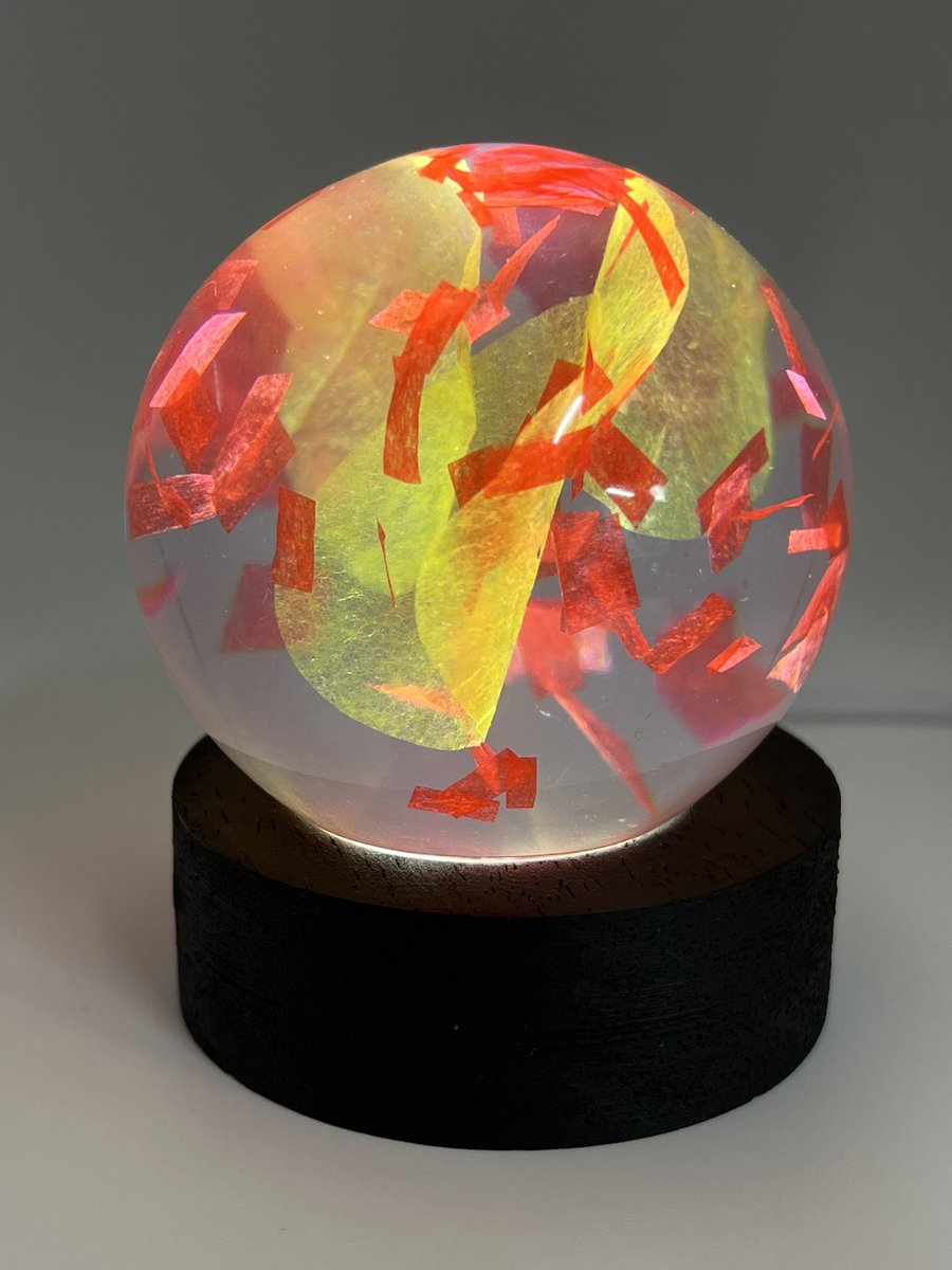 ZaoNecklaces's tweet image. Remember the jumpsuit petals and red 2017 confetti from a few days ago? 
They have been transformed into a light and on my site. Confettithings.square.site