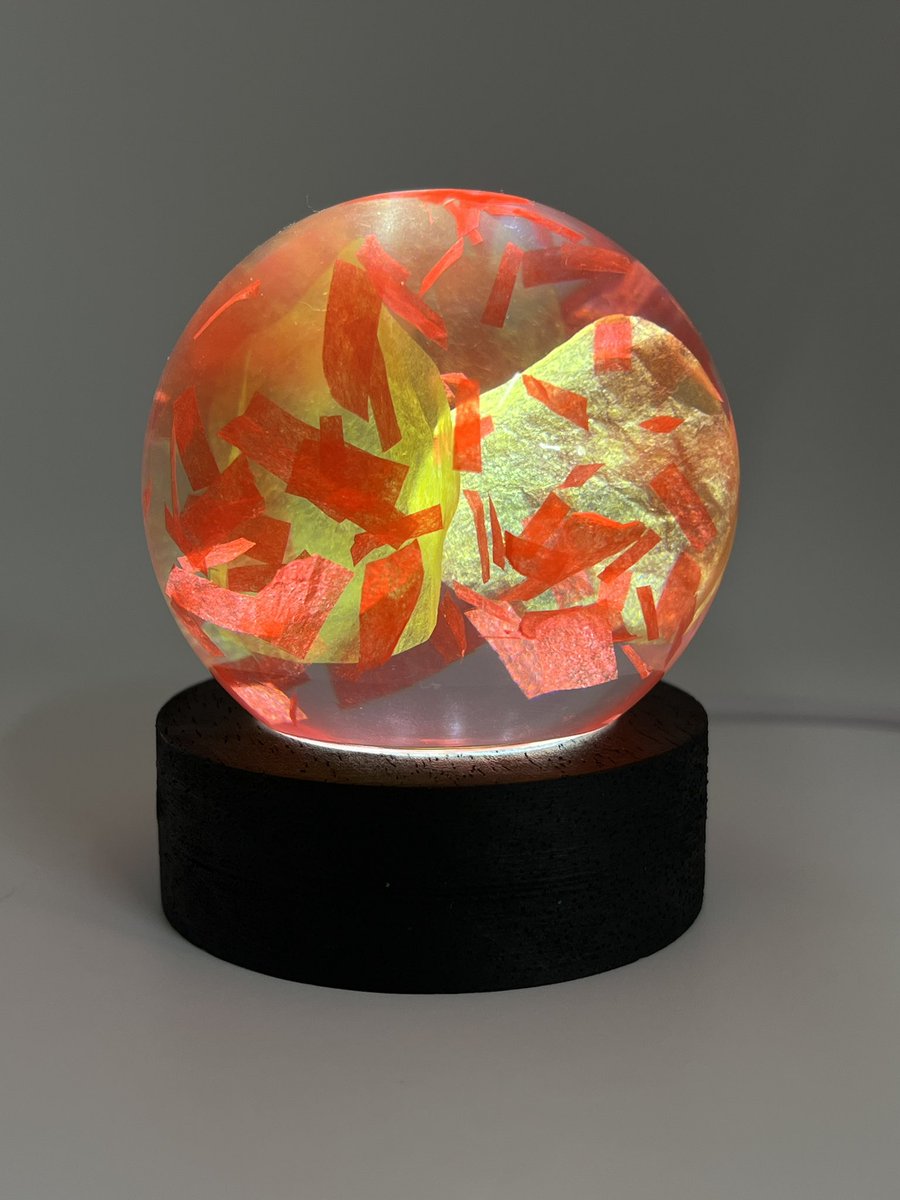 ZaoNecklaces's tweet image. Remember the jumpsuit petals and red 2017 confetti from a few days ago? 
They have been transformed into a light and on my site. Confettithings.square.site