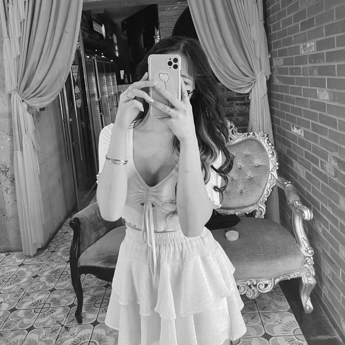 An ancient oak, roots deep in the earth, branches reaching for the sky.