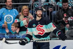 Bjorkstrand skating during warmups in winter classic jersey