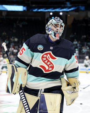 Daccord skating during warmups in winter classic jersey