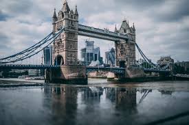 Tower Bridge framed by the Tower of London, an 800-year tale of London's evolution. Gothic meets medieval, an architectural dance across centuries. Icons in harmony, bridging the past and present, a timeless symphony of design. #LondonLegends #ArchitecturalMarvels