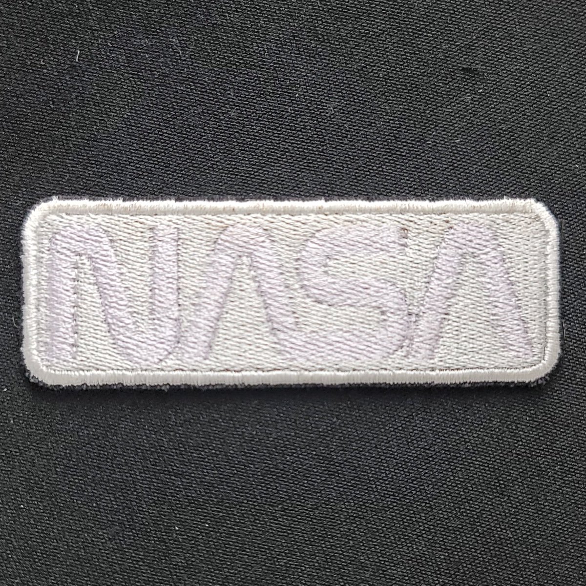 ClassyAsHell's tweet photo. NCW-7: The logotype should never be shown in light benday screen against a white background. It should always be shown in solid black, solid warm gray or solid NASA red. https://t.co/wBzuYkuch2