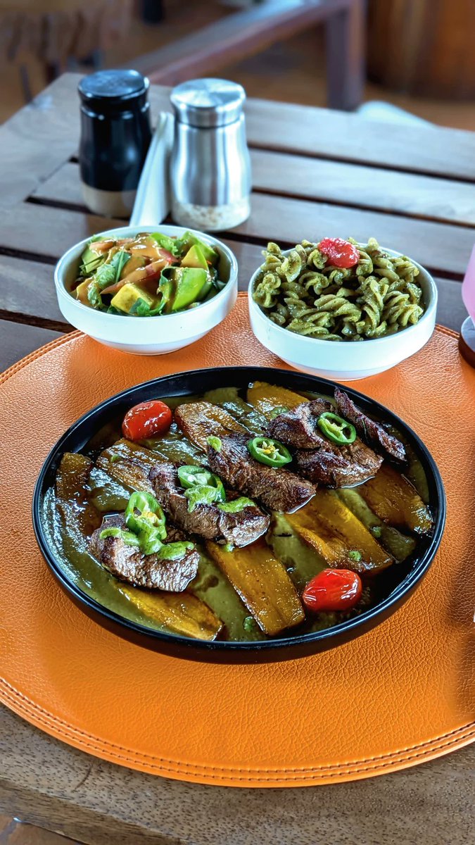Grilled goodness meets tropical flair at #Thealeph 🌴🔥 Savory steak, crispy plantain, and zesty jalapeno sauce unite!