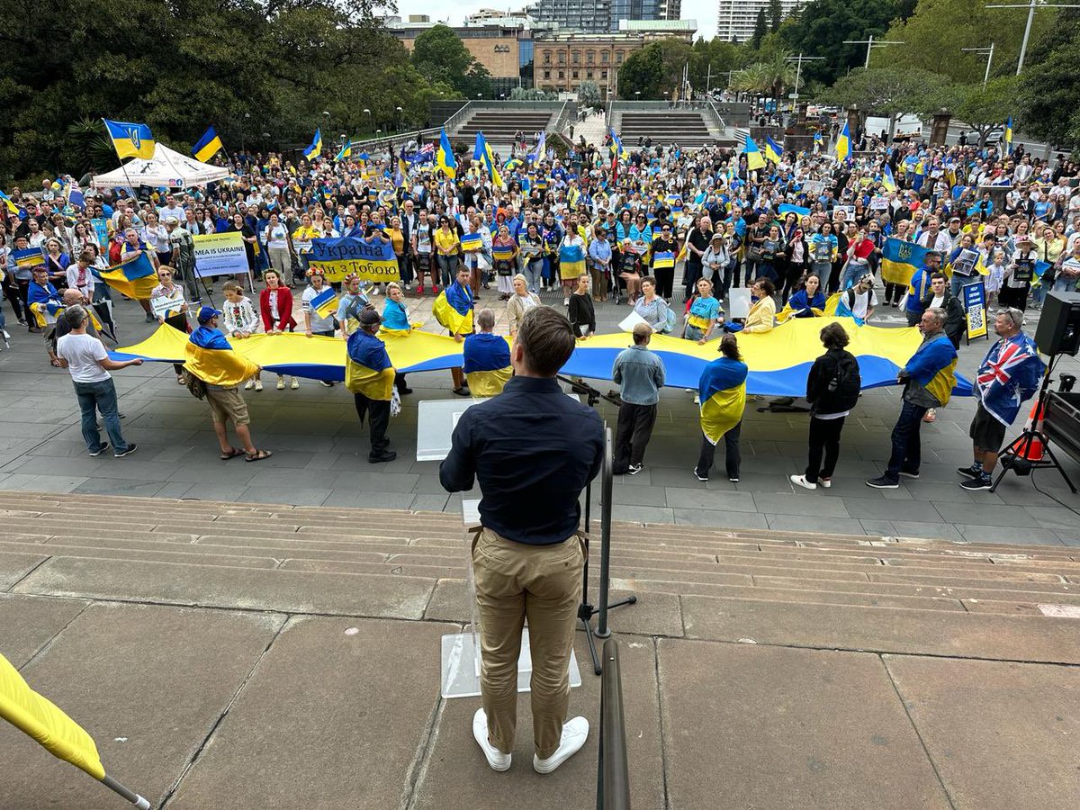 mishazelinsky's tweet photo. 2 years ago, the world changed forever when Vladimir Putin commenced his full scale invasion of Ukraine.

2 years of brutality, murder and war crimes.

But 730 days into Putin’s 24 hour war, Ukraine is still standing and is still free.

This is a hinge moment of history.

What happens in Ukraine, matters everywhere — our fates are intertwined.

Do we want a world where big countries can eat little ones because they don’t like them? 

Or one where Dictators can destroy democracies? 

A world where might is right, is not a world in which Australia can survive.

The lessons drawn from his conflict will come down to our choice.

And history will record what we do.

If you want to help, please donate: https://t.co/nGE1XFUMbl

Tell your political representatives to send weapons.

It’s been the honour of my life to tell the story of Ukrainians in their struggle for freedom.

Slava Ukraini. ✌🏼🦘🇺🇦