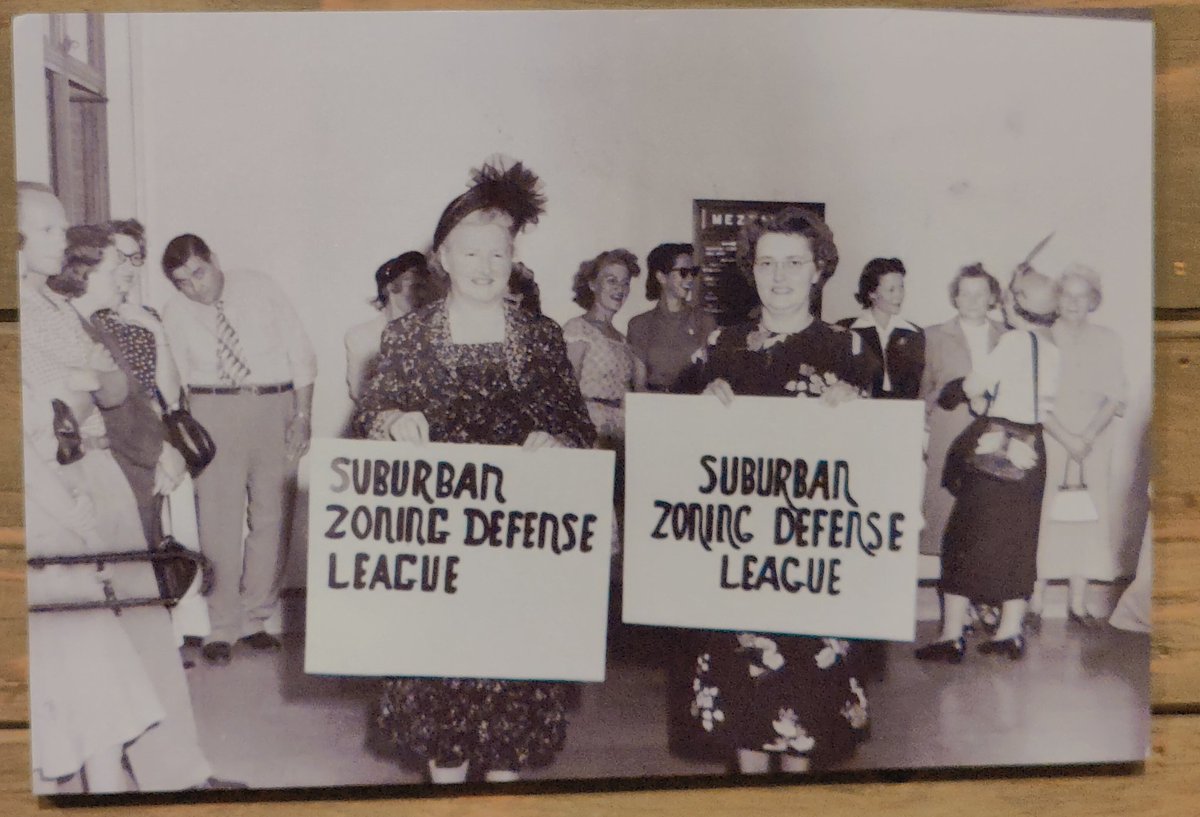 _fruchtose's tweet photo. Yesterday I visited the Oakland Museum of California. The permanent exhibition includes a wall showcasing legal measures white residents took to drive out immigrants and minorities in the past 2 centuries. Among the materials was this picture of single-family zoning defenders. https://t.co/XLZSz67BCq