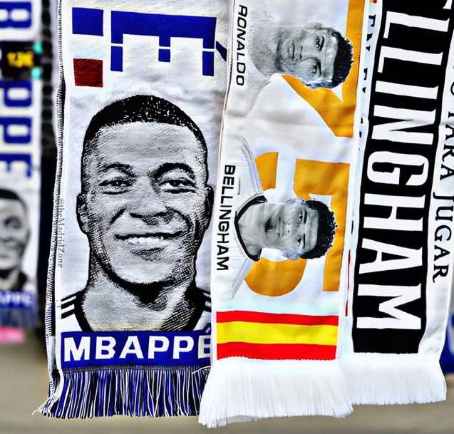 ActuFoot_'s tweet photo. On peut déjà se procurer l’écharpe 🧣 de Kylian Mbappé devant le Santiago Bernabeu. 🤍😅 https://t.co/QzsbcmO3jZ