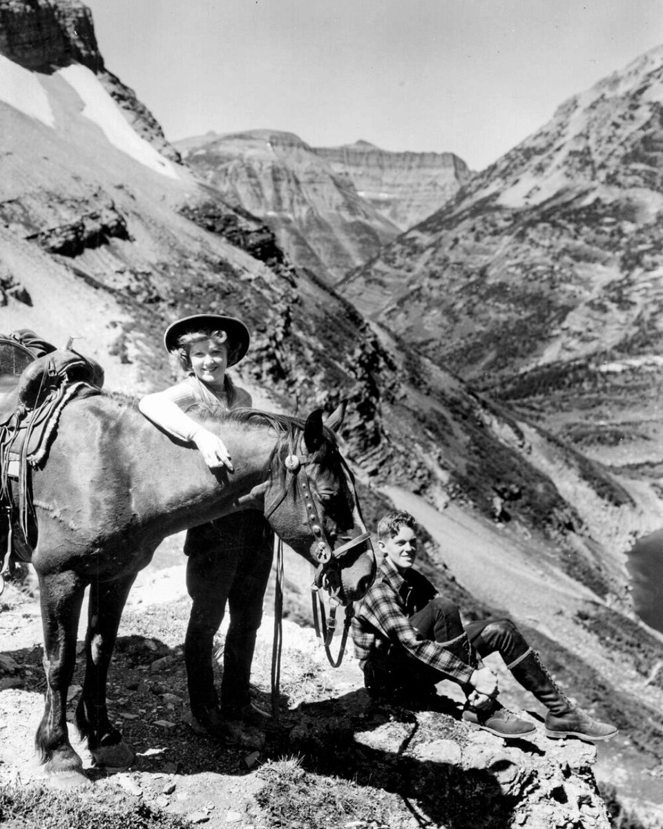 Two horseback riders rest near Stony Indian Pass, 1939. 📸: T.J. Hileman