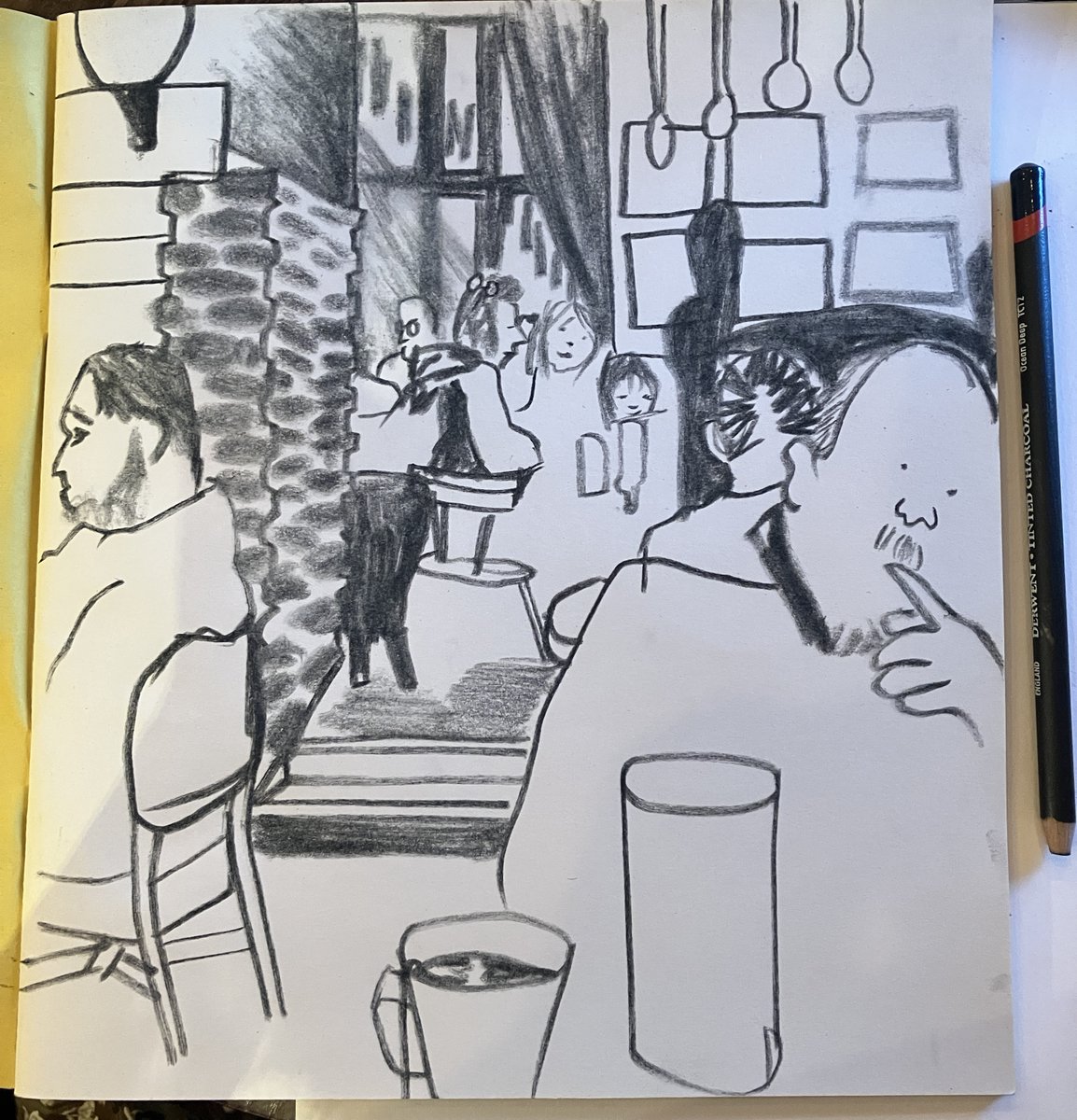 drawing in the Harvester today, me and charcoal