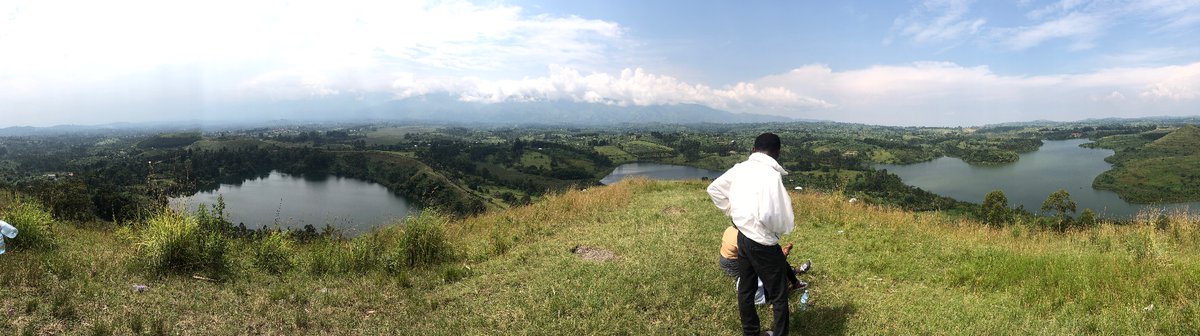 VaRouge's tweet photo. @WillieHandler A panoramic view of three crater lakes with the Rwenzori mountains in the distance, Uganda, 2019 https://t.co/K7LxaFuj2o
