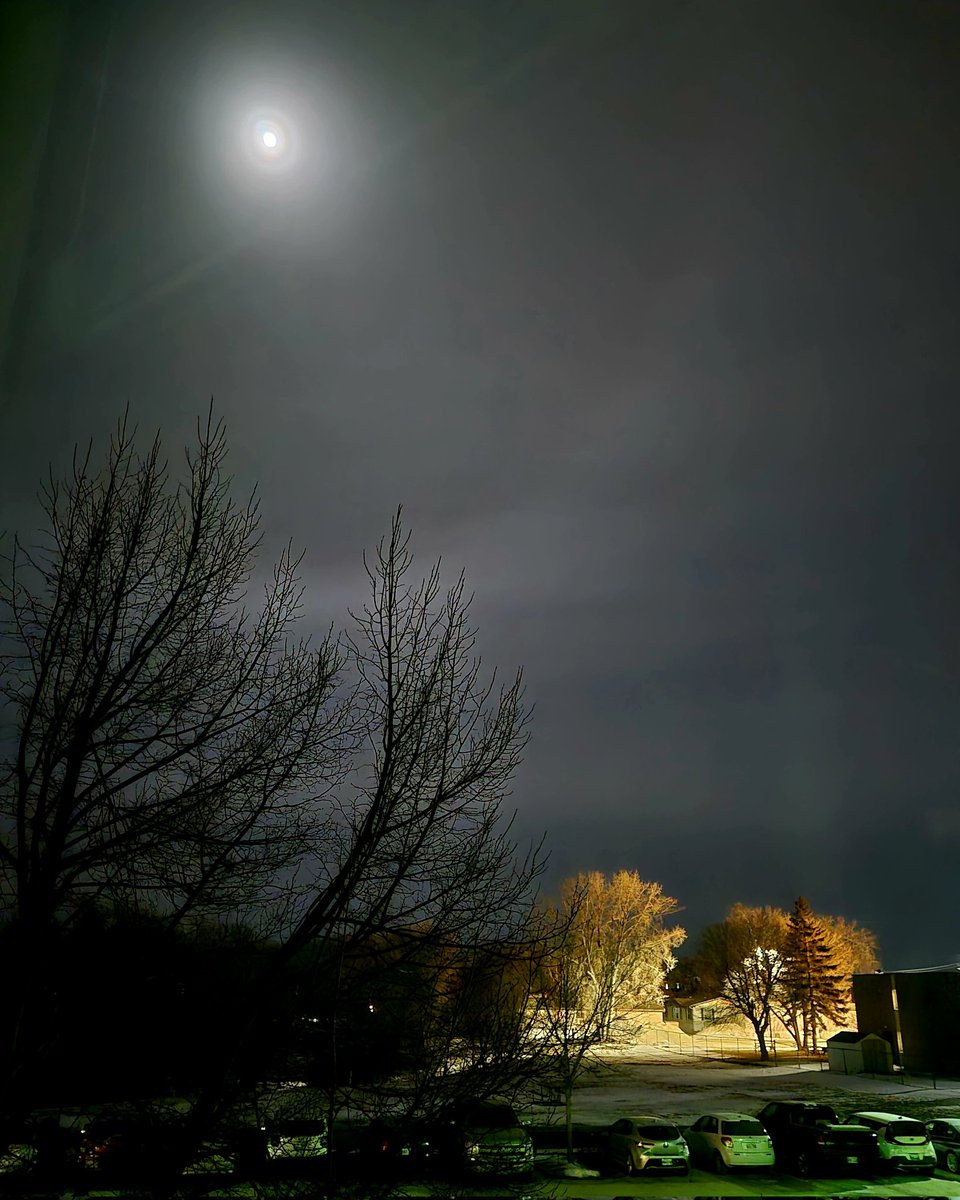 Full moon over artificial light. #Winnipeg /
