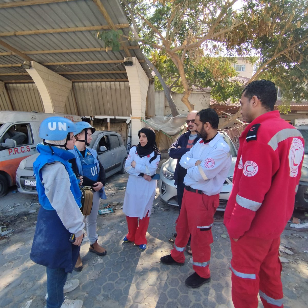 PalestineRCS's tweet photo. During yesterday’s visit by a UN delegation to PRCS Al-Amal Hospital in Khan Tunis , which has been under siege for the thirty-fourth consecutive day, the delegation witnessed the extent of the damage caused by Israeli occupation artillery shelling to several floors of the hospital, as well as the catastrophic conditions inside due to severe shortages in food, drinkable water, medical supplies, and medication. 
📷Photo by volunteer: Amer Abu Aisha.
#AlAmalHospital #NotATarget ❌ #IHL #Gaza