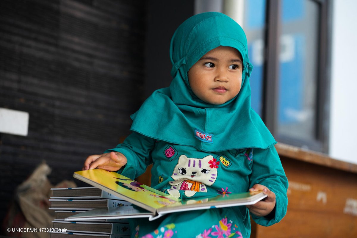 Three-year-old Kinati from Indonesia explores the world between pages. Early learning opportunities help children gain critical skills that shape their futures. UNICEF works with partners globally to protect every child’s right to quality education.