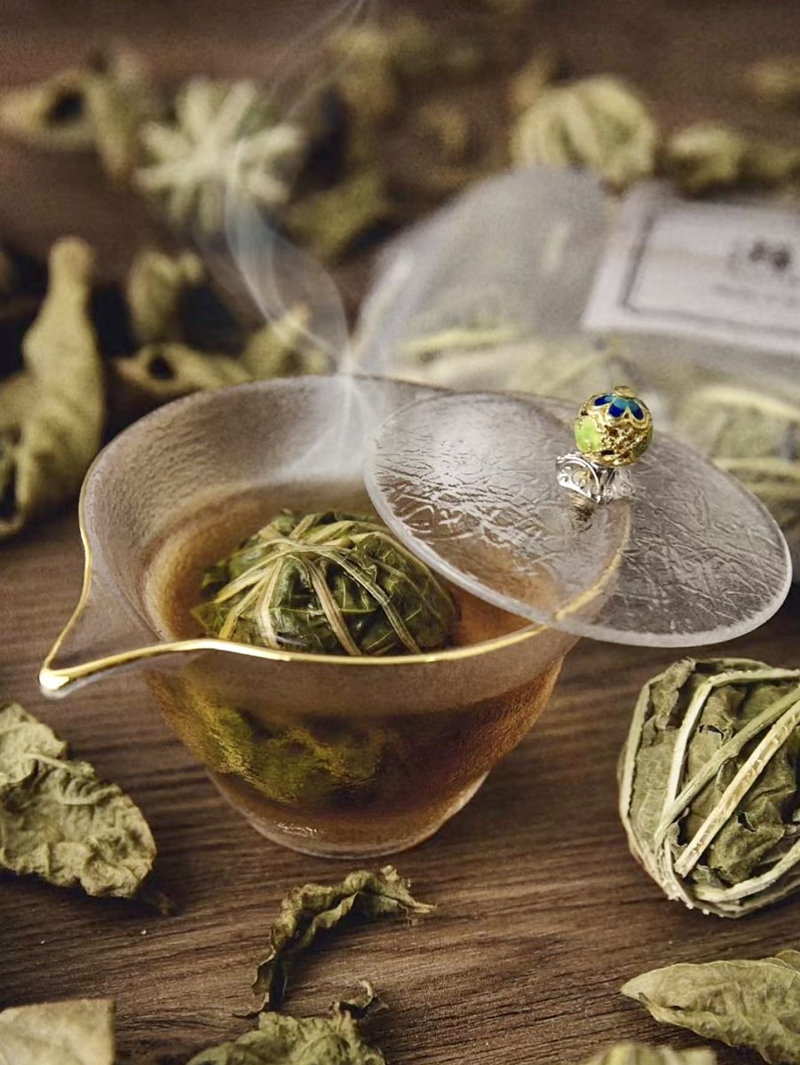 GoSanyaOfficial's tweet photo. Partridge tea is a specialty of Hainan. This tea has rich aroma and pharmacological effects. It is a very popular local tea. Partridge tea is strung together like Buddhist beads and each tea ball is as big as a table tennis ball, which is very unique. #Partridgetea #Sanya https://t.co/QwzSRXUksd