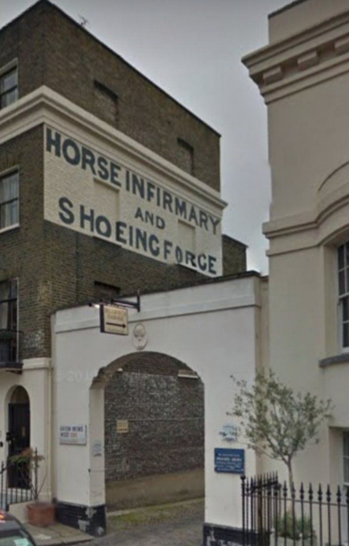 A Ghost Sign Restored. The first picture shows a faded ghost sign by the entrance gate of Eaton Mews West, where a Horse Infirmary once was. At some point it was decided to rejuvenate the faded sign, which restores our knowledge of what was once here.