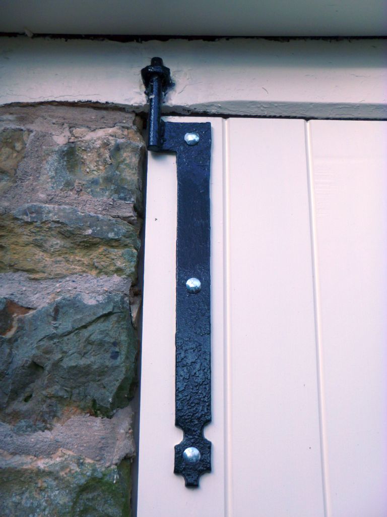 We reused the old blacksmith-made hinges on the new Shandy Hall garage doors. Nicely painted by Paul Masiak Painters of York. #ShandyHall @YorksVernacular @hbap1924 @jpwarchaeology #handmade #heritage #architecture #ironwork #historicbuildings #historichouses #blacksmith