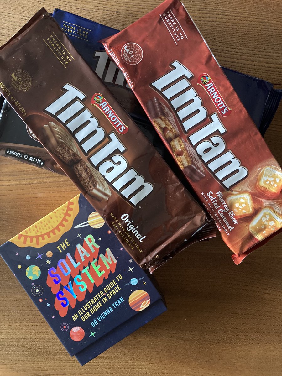 My brilliant @_illustrationX agent in Australia sent me a copy of The Solar System card deck I worked on for Smith Street books, and a pile of Tim Tams!!! #illustration #books #thesolarsystem #timtams