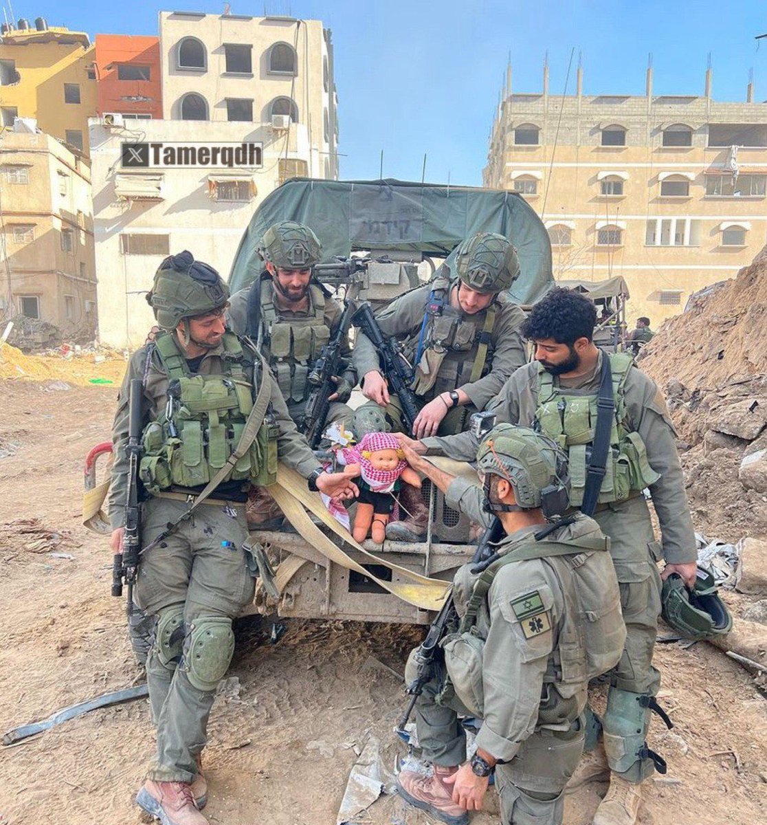 lsraeli soldiers kill our children, Then take photos with their toys. #Gaza