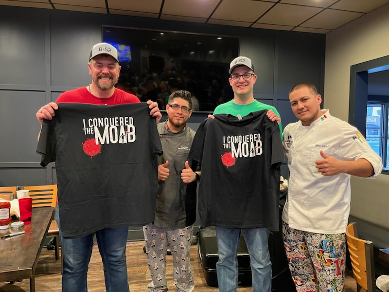 Competitive eaters @ethanteske (green shirt) and @RandySantel CRUSHED the Mother of All Burgers before a quick pose with the talented Chefs who fed them. #foodchallenge #whosnext