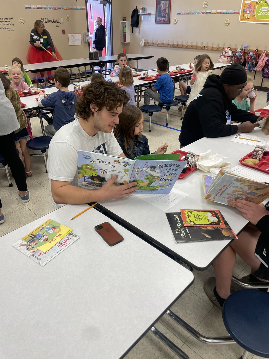 Making a positive impact one day at a time📚 This morning several of our student athletes spent time volunteering in the Early Bird Reader program at Burcham Elementary! #EAT