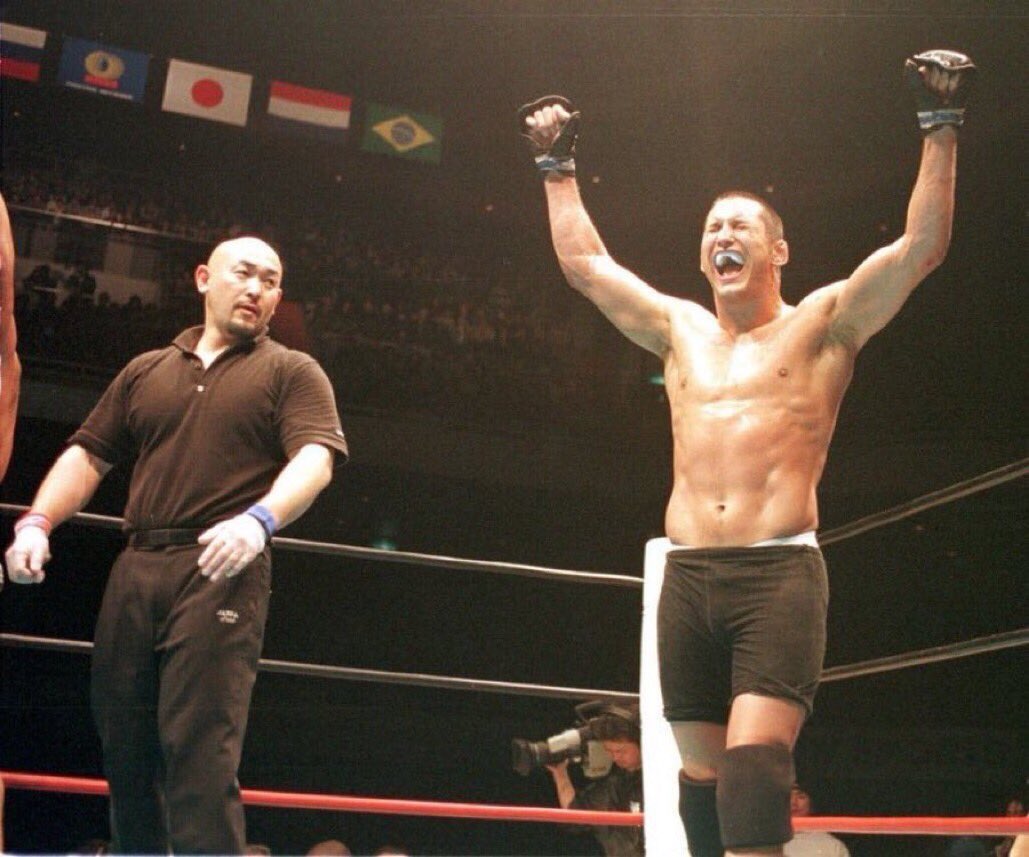 MMAHistoryToday's tweet photo. Feb26.2000

Dan Henderson raising his hands after he defeats Gilbert Yvel, Antonio Nogueira &amp; Renato Sobral in one night to win the 1999 King of Kings tournament finals. https://t.co/RSSAi1xw7W