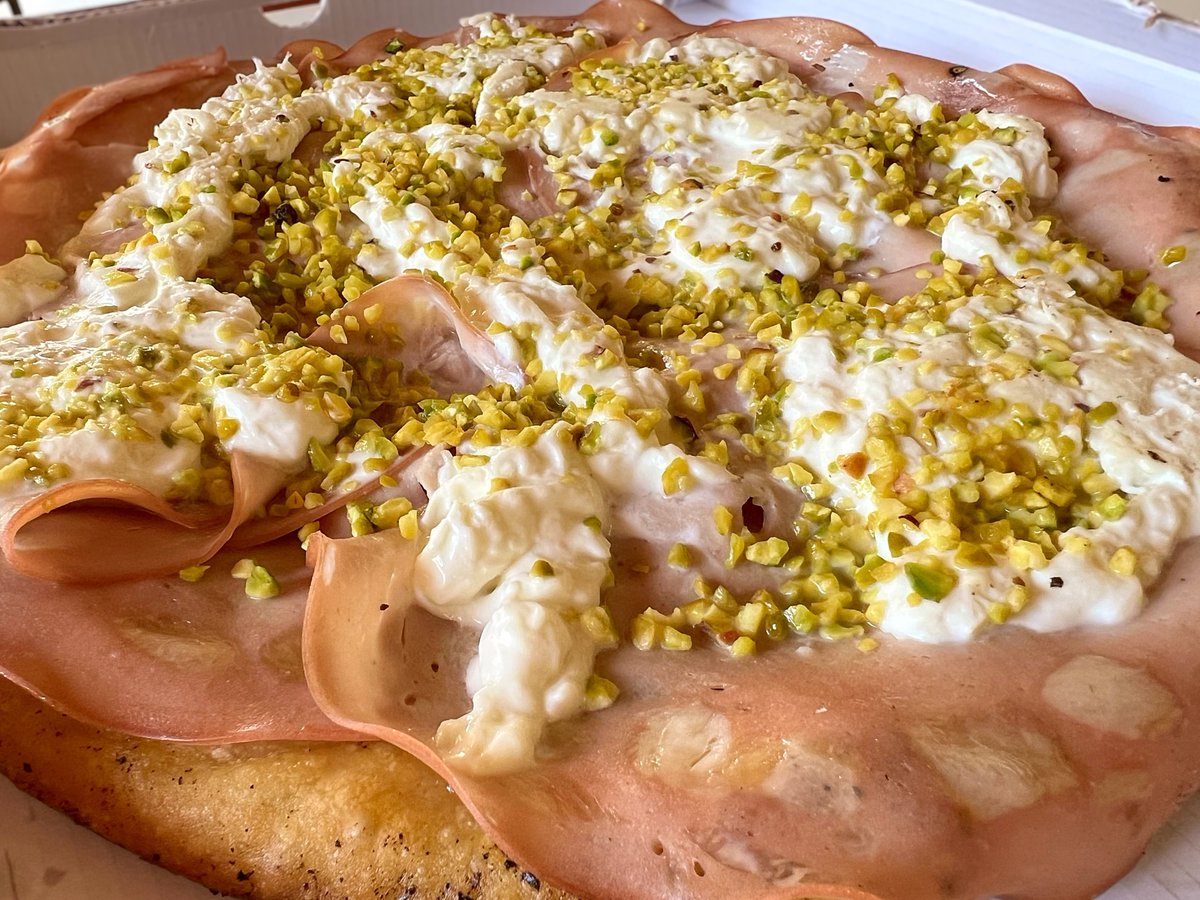 Celebrate World Pistachio Day: fresh from the baker’s oven - focaccia barese topped with mortadella, fresh local burrata cheese and a generous sprinkle of chopped pistachio. #ilikeitaly #travelinitaly #EatIT #EatPuglia #giornatamondialedelpistacchio #WorldPistachioDay