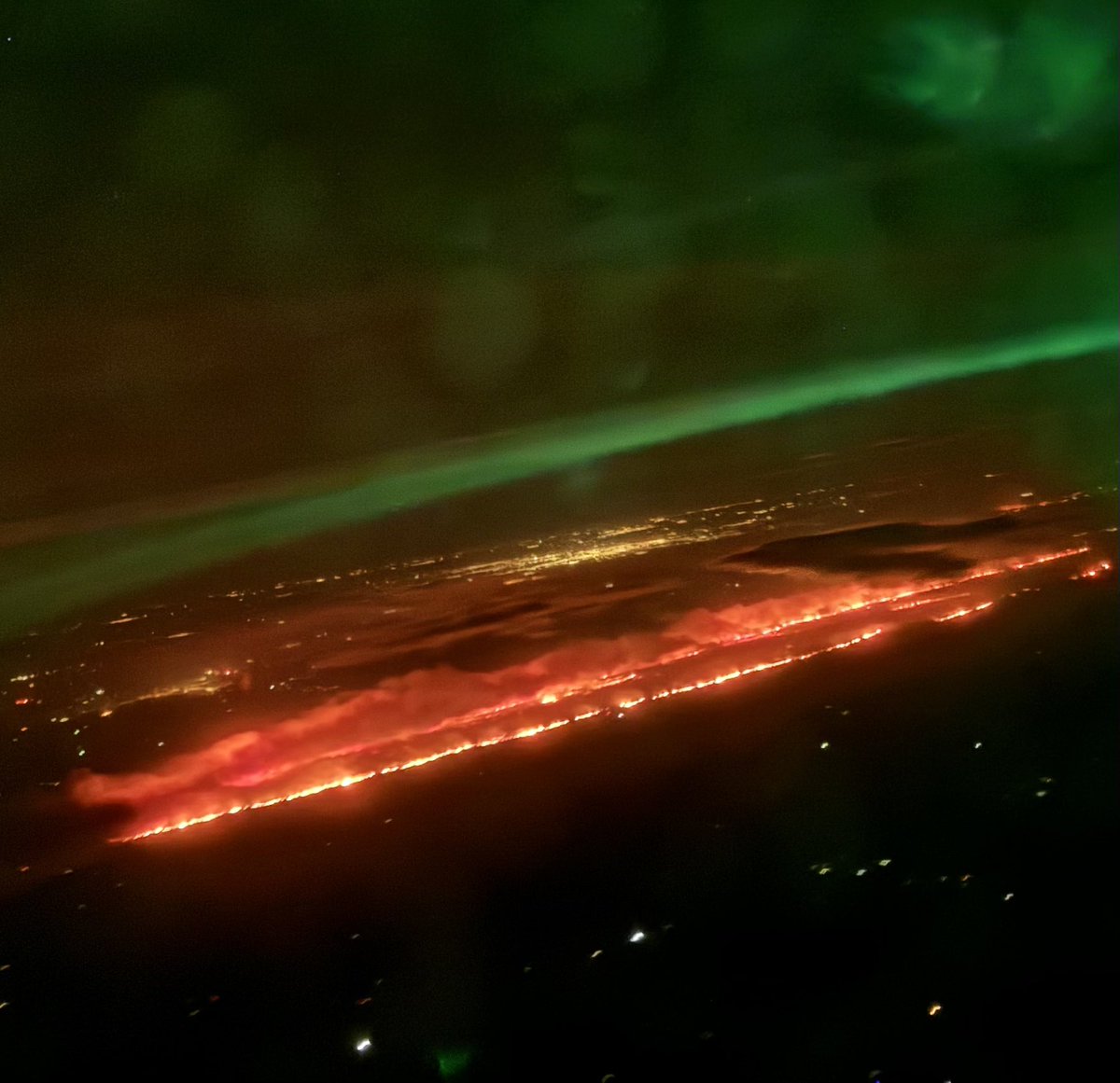 btsullivan91's tweet photo. Flew over crazy scenes in the Texas panhandle, wildfires have broken out everywhere it seemed. They were spanning the skyline! Sorry for the picture quality, they don’t do it justice, the plane cabin lights were on. Was a smoky sky all the way into OKC #txwx #okwx https://t.co/4sDTHMGy9Z