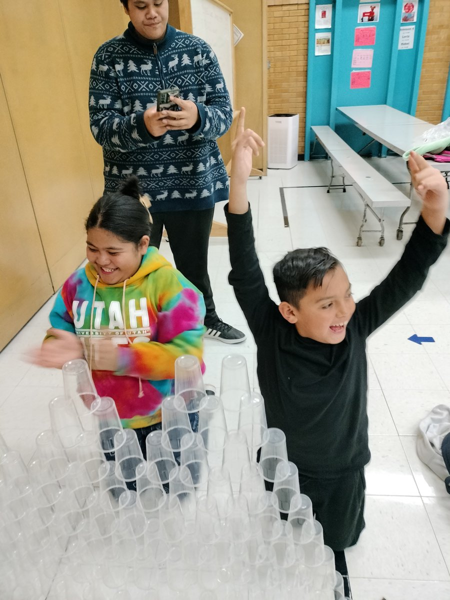 YouthServiceSLC's tweet photo. Students, staff, and families at Western Hills Afterschool Program participated in a We Love STEM Family Night. Students engineered 100 cup towers, made diffusion art bags with Chemistry principles, and played with robot chameleons. https://t.co/5zTrbXP4yj