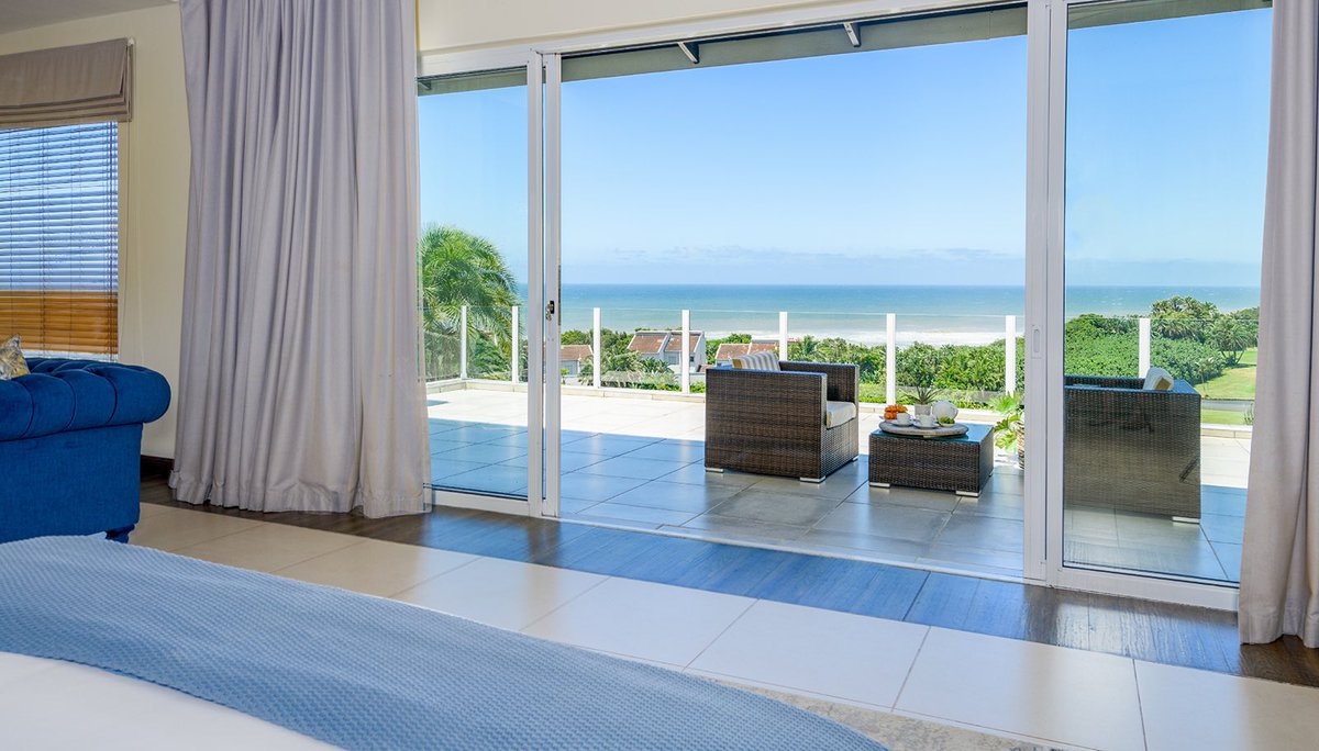 The expansive suite, meticulously designed for indulgence, offers more than just a stay. Step onto your private balcony, where the sea breeze carries with it the sounds of the waves. Book your stay today: 11onfairway.co.za #11onFairway #seaescape #SeasideLiving