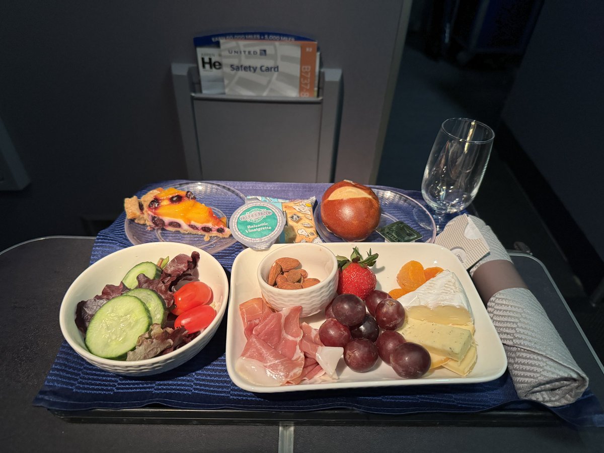 The fruit and cheese plate is the best bet on @united #firstclass #inflightdining #thebulkheadseat