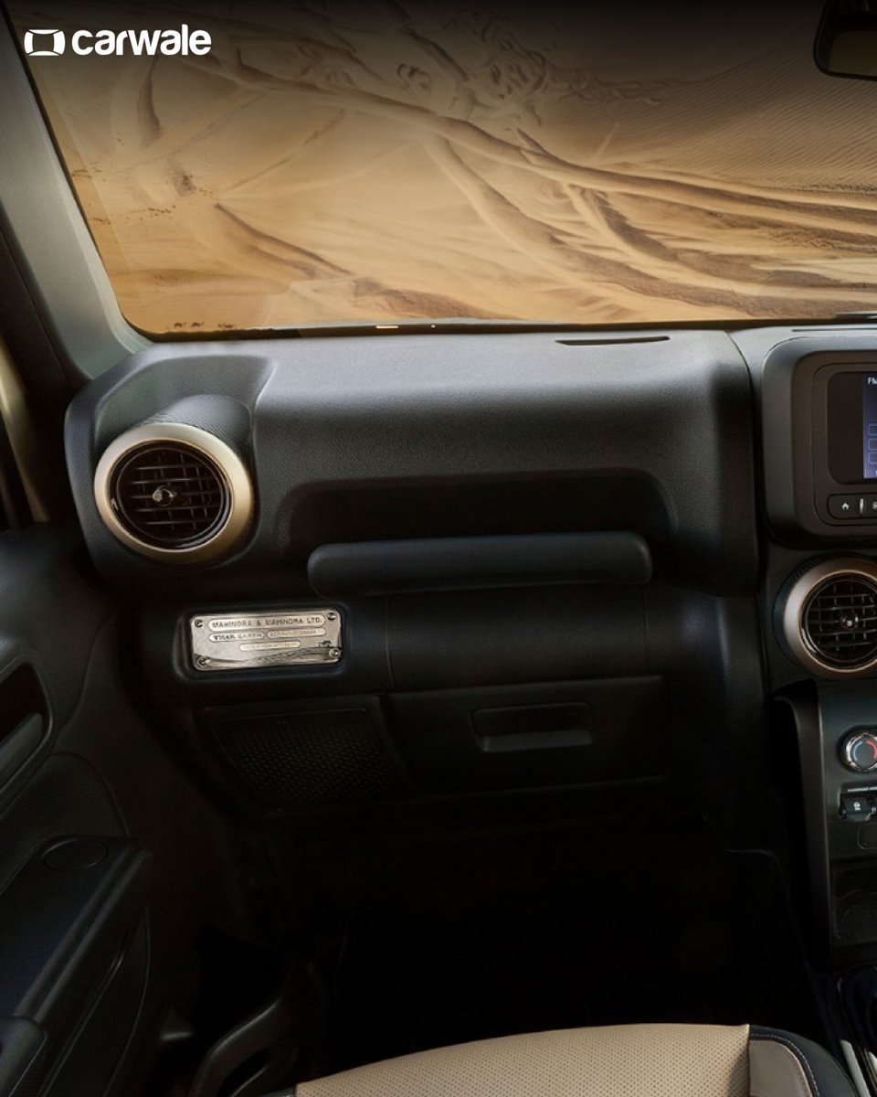 CarWale's tweet image. #MahindraTharEarthEdition launched with a starting price of Rs. 15.40 lakh (ex-showroom).
- New Desert Fury matte colour
- 'Earth' badge
- Matte black lettering
- Beige and Black interior theme
- Dark chrome accents on gear knob, centre console, and steering wheel logo

#CWLaunch