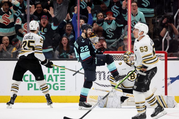 bjorkstrand in the middle cheering in front of bostons net after scoring 