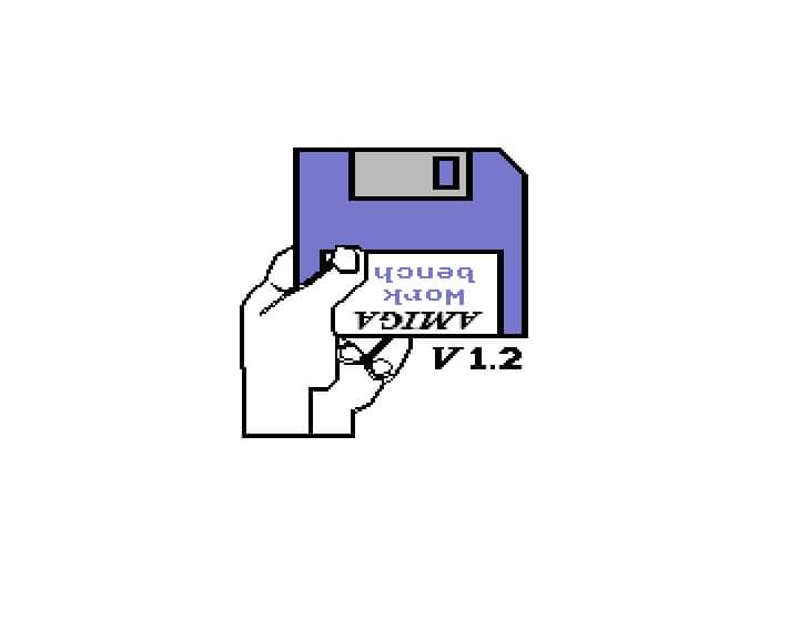 Funny that the Amiga workbench screen shows a left hand holding the disk, this would have been pretty awkward as the disk drive is on the right side of the computer. It was drawn this way as the artist held the disk in the left hand for reference 😁 #amiga #workbench #floppy