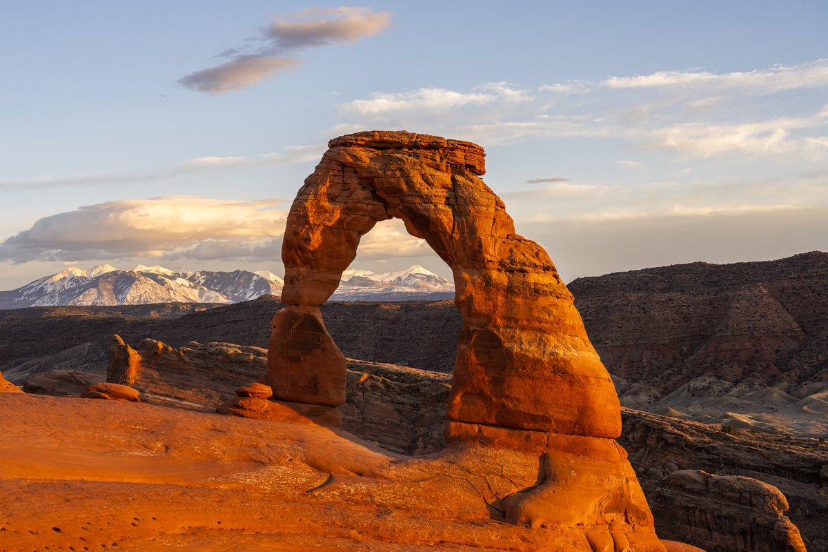A photo of Delicate Arch during a windy sunset. #archesnationalpark #photography #Utah