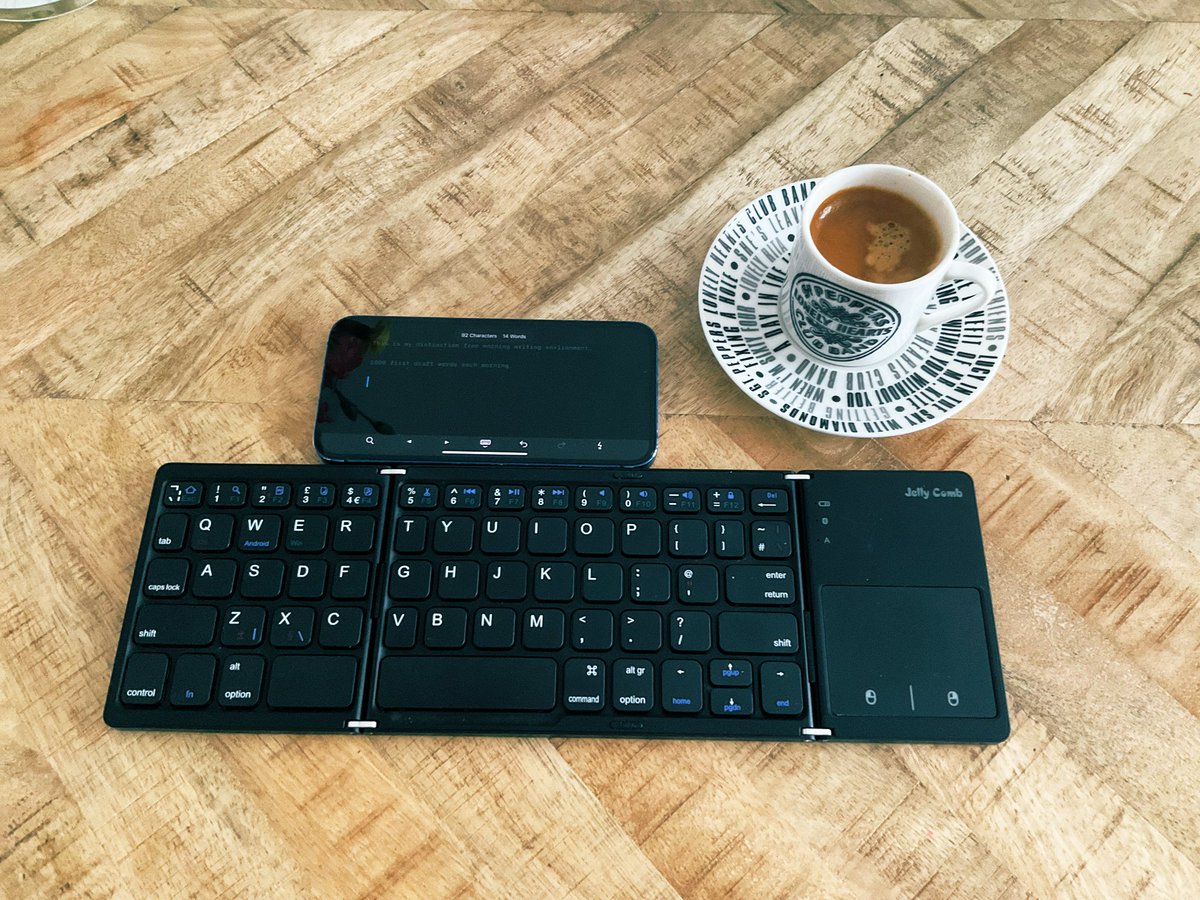 This is my fold up keyboard I can take anywhere for a minimal distraction free writing environment for first drafts. 

1,000 words a day each morning after a workout and walk. 

IAWriter on typewriter mode.