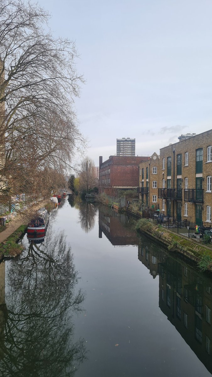 Miles of beautiful canals. The factory building is where Spitfire propellers were made. The tower block in the background is where grime music originated. #LoveTowerHamlets