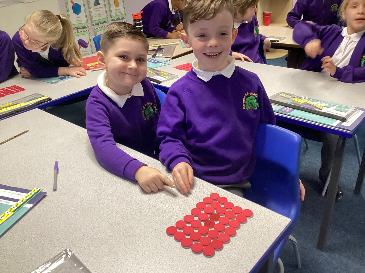 Year 2 proving that multiplication is commutative and showing the two multiplication sentences that can be seen in an array. They could even use this to help solve problems @GarswoodPrimary