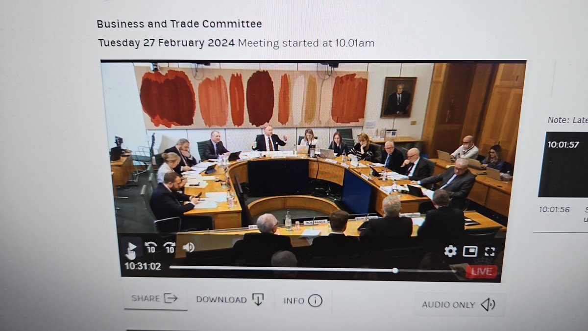 The backdrop at the business select committee looks the same as my lounge wall...which is covered in paint samples!