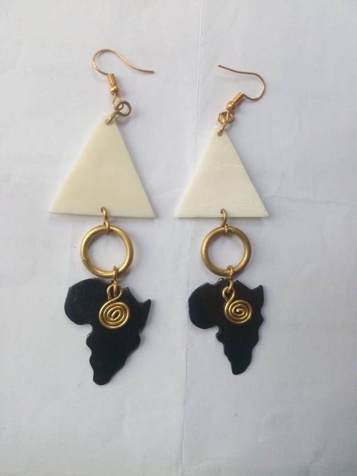 African earrings made out of bone at cool price. Buganda road craft village CRAFT AFRICA Shop no_CA17 or Tell +256 757573785