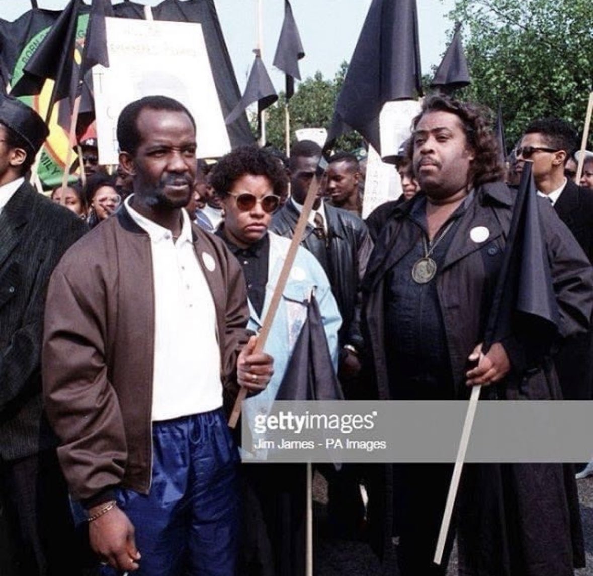 TheRevAl's tweet photo. Riding from NBC London studios to Cambridge University, I thought about how 33 years ago I led a march here over the racial killing of a young black man called Roland Adams. This is a photo of that march with his parents w/ me.
#RevAlThrowback https://t.co/xk6nQqCQGX