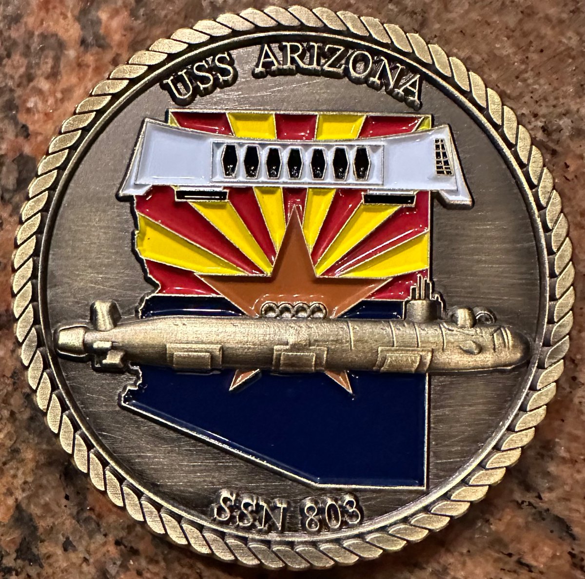 A challenge coin from Commanding Officer of the USS Arizona (SSN-803).  Thank you Commander Tom Digan. GO NAVY!
