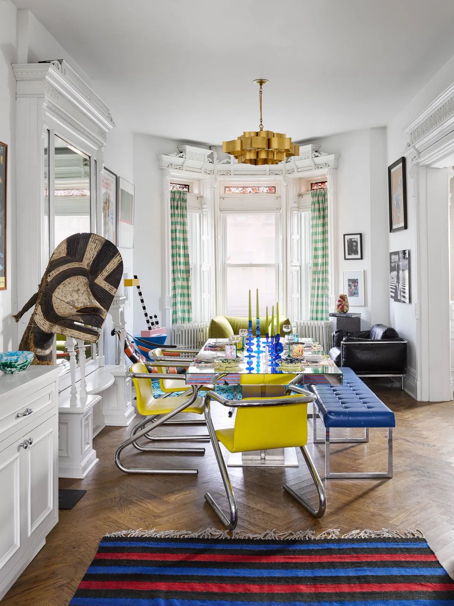 A look inside of Gabriella Karefa-Johnson’s home in Bed Stuy. This piece was written by Wendy Goodman for New York Magazine, Curbed. Gabriella’s home is full of pops of color, vintage magazines and movie posters, reupholstered chairs and lots of art. She decorated this home