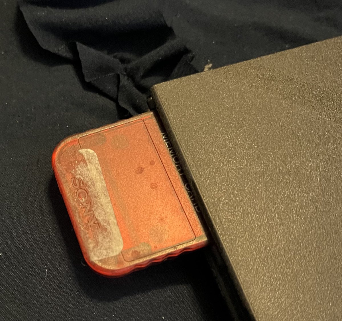 gaming_poet's tweet photo. #PlayStation 
Cleaning off my shelf to plug in my PS3 I found my old PS2 and a memory card. Remember memory cards? 
Will either of these still work? idk. Hopefully🤞. My shelf needs dusting off anyway. https://t.co/guYDTgyJRL